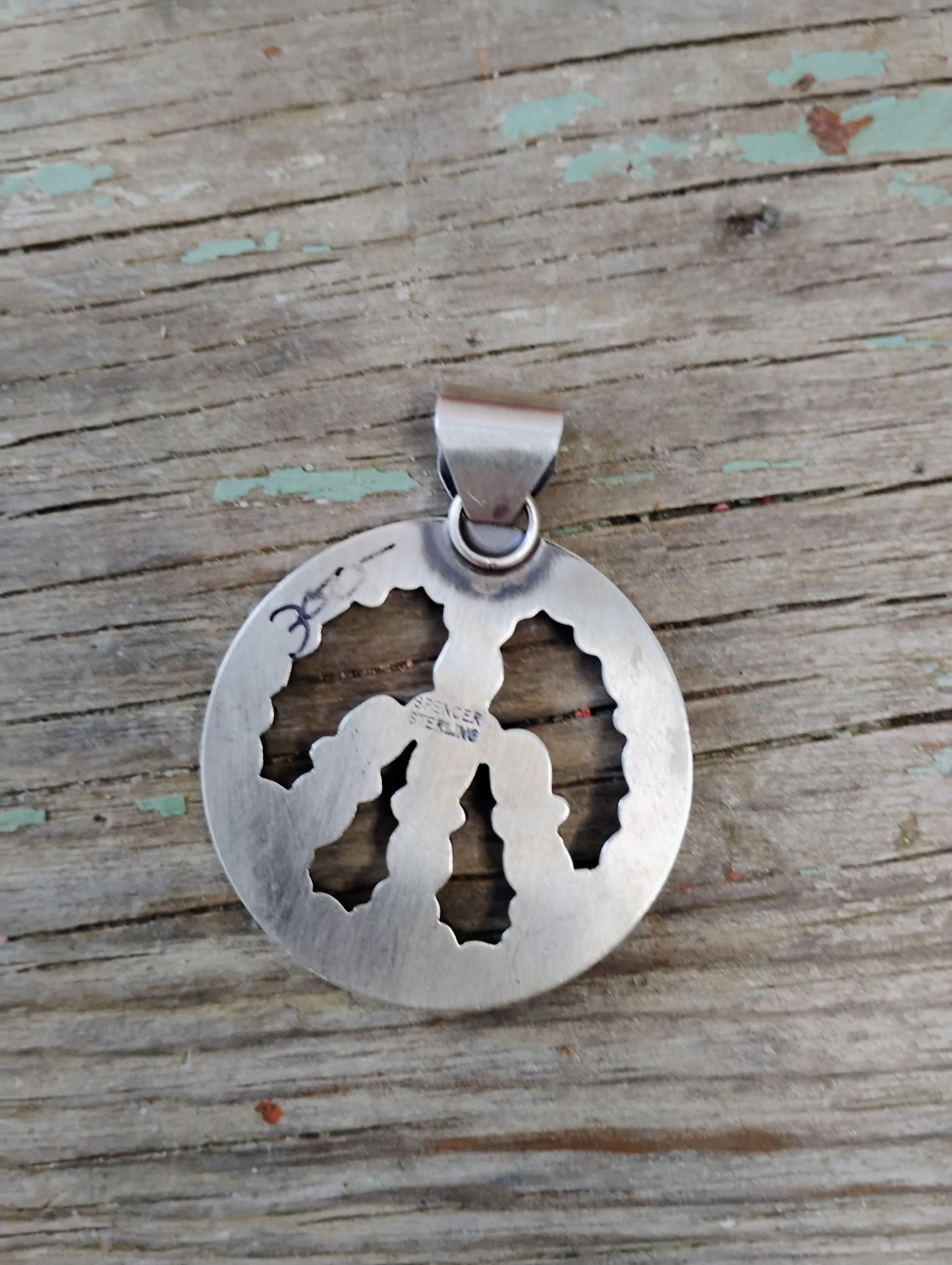 Turquoise peace sign