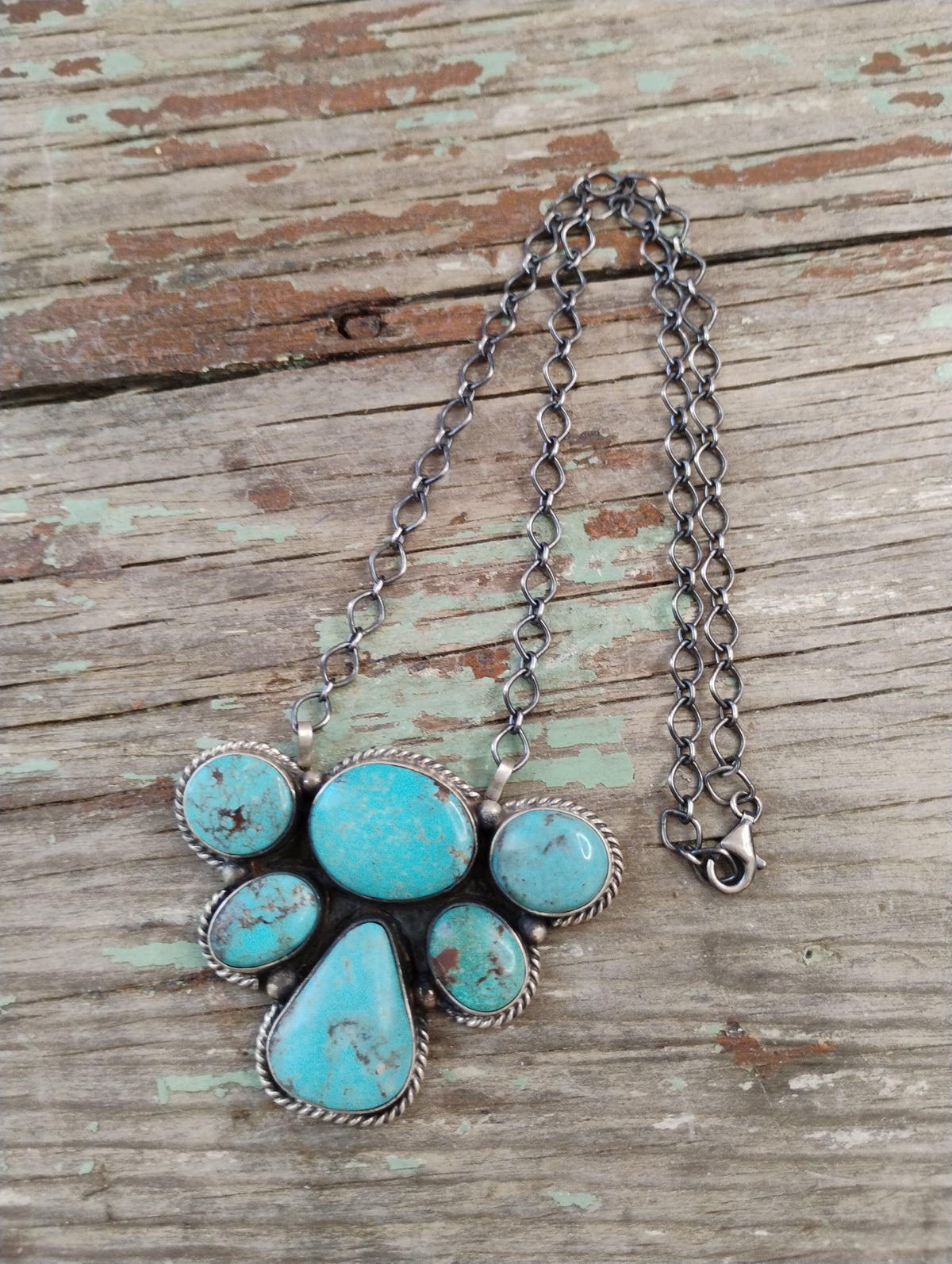 Native made turquoise half cluster