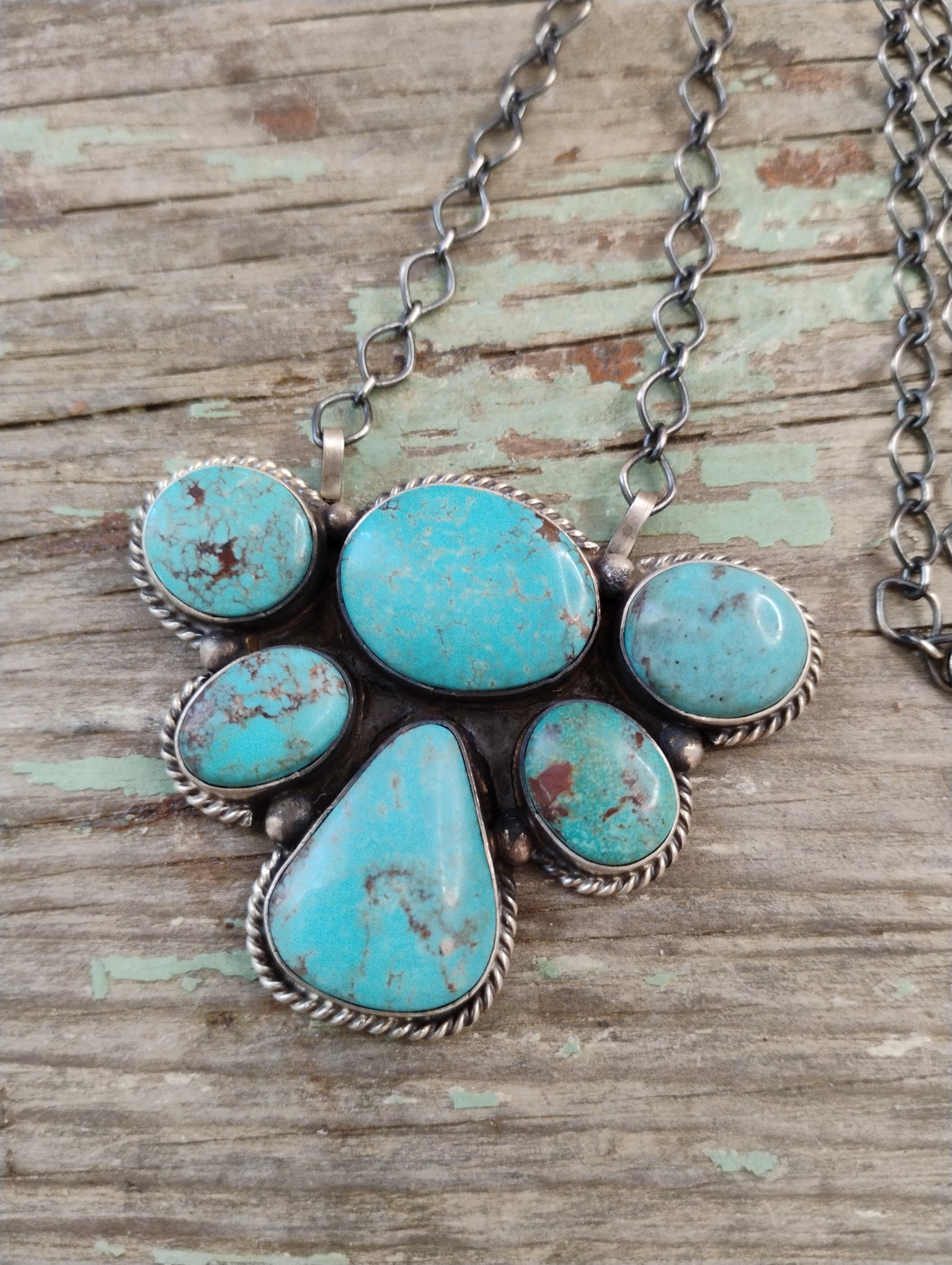 Native made turquoise half cluster