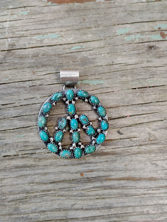 Turquoise peace sign